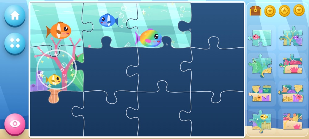 Sea Jigsaw: a half-finished jigsaw of reef fish, with loose pieces waiting in a tray